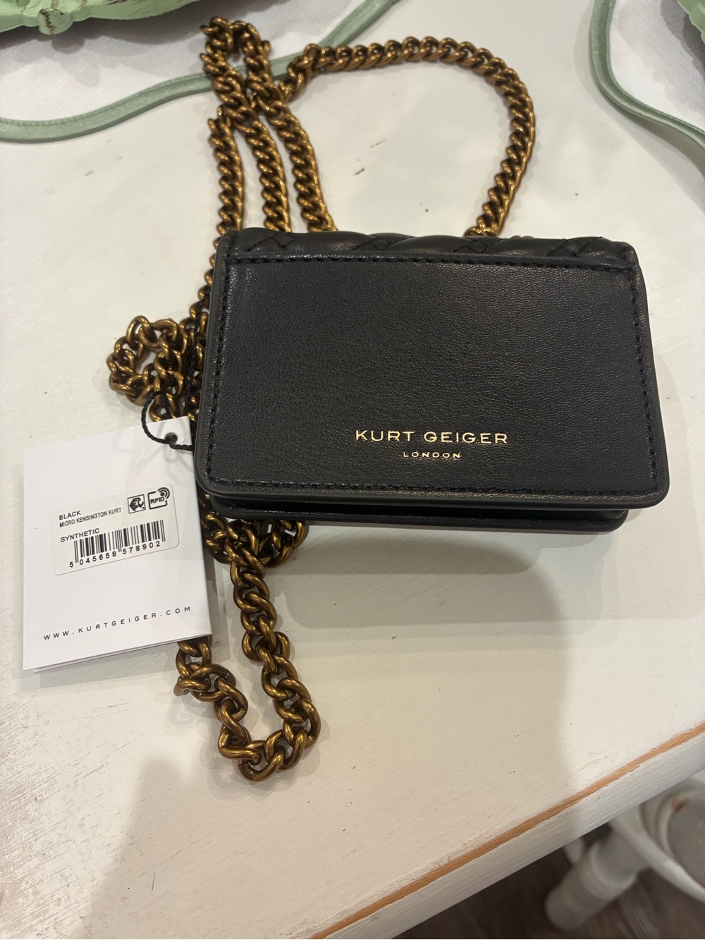 Kurt Geiger Quilted Mini Crossbody in Black with Gold Letters - Picture 2 of 4